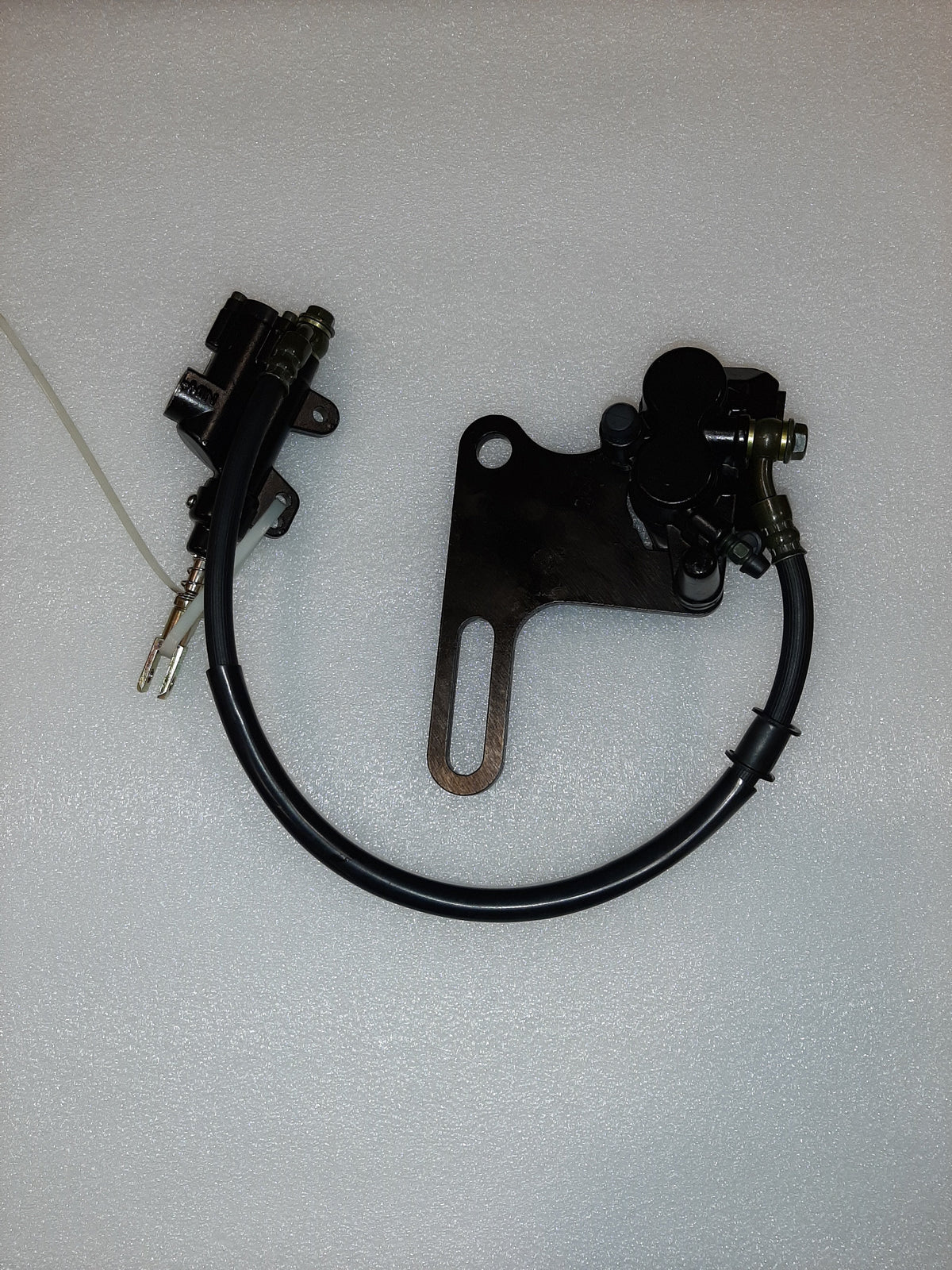 GX110 Rear caliper assembly